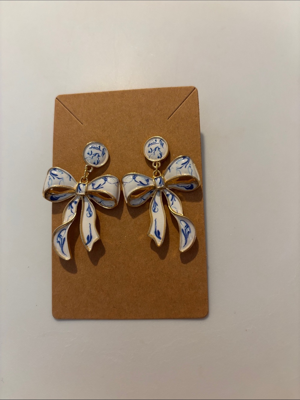 Fashion Jewelry Gold-Tone Bow Drop Earrings with White and Blue Enamel - Picture 2 of 5